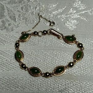 Vintage gold filled bracelet with green cabachons